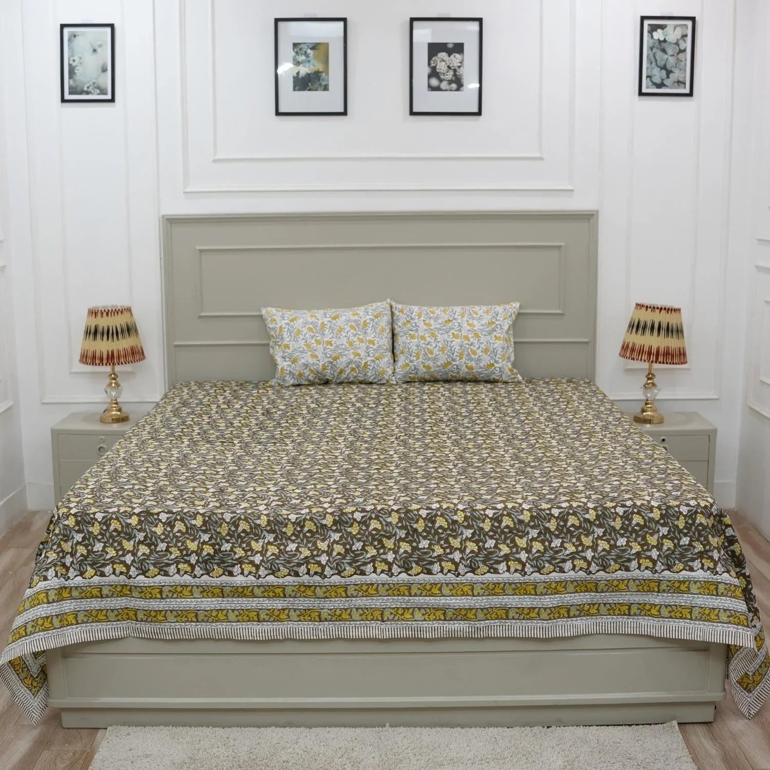 A celebration of Indian artistry, this bedsheet and pillow cover set is hand block printed on breathable cotton. The floral patterns bring warmth and elegance to your decor with every touch.