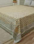 Embrace rustic charm with our block printed cotton bed linen. The floral patterns, hand-stamped using wooden blocks, celebrate Indian craftsmanship. This breathable cotton bedsheet and matching pillow cover add a soulful, artisanal touch to your home.