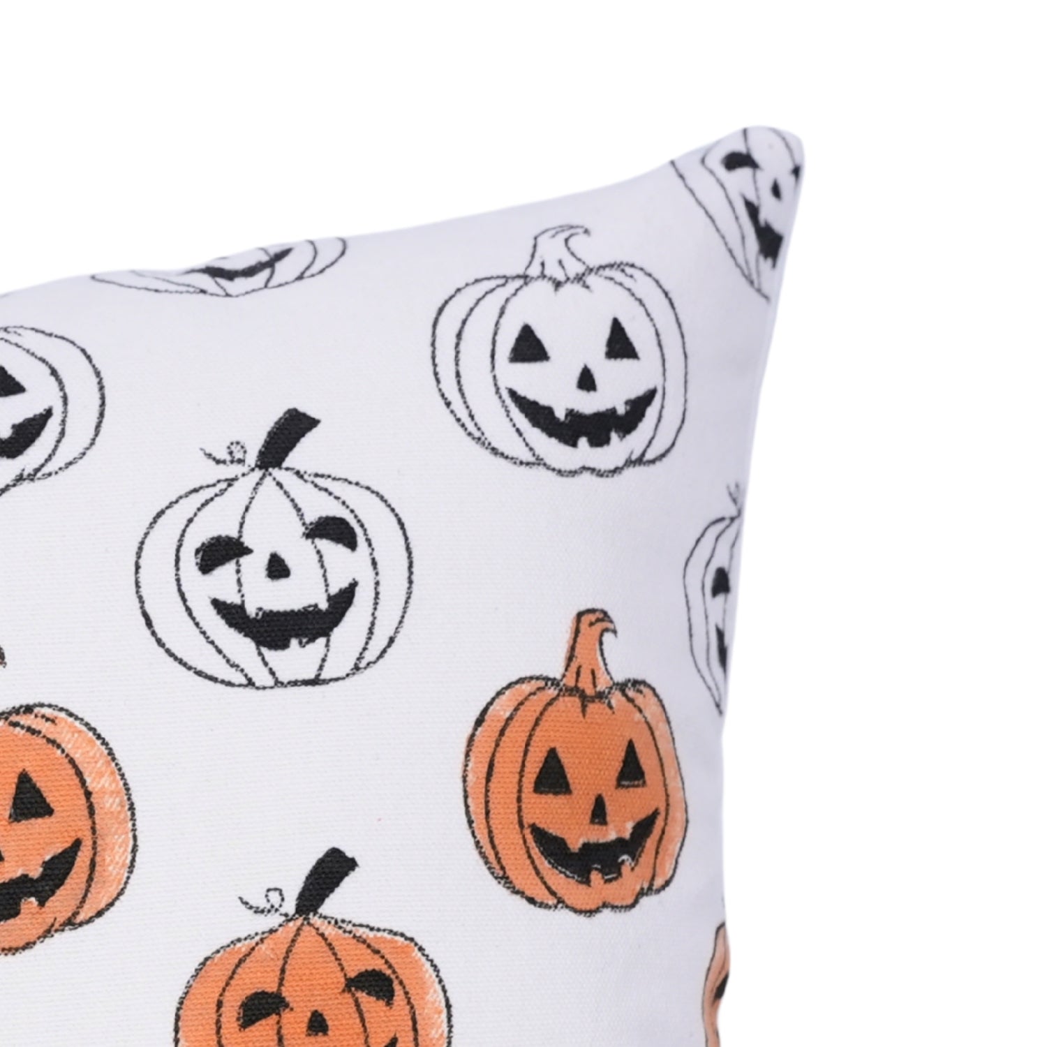 Pillow corner with Halloween-themed pumpkin pattern on a white background