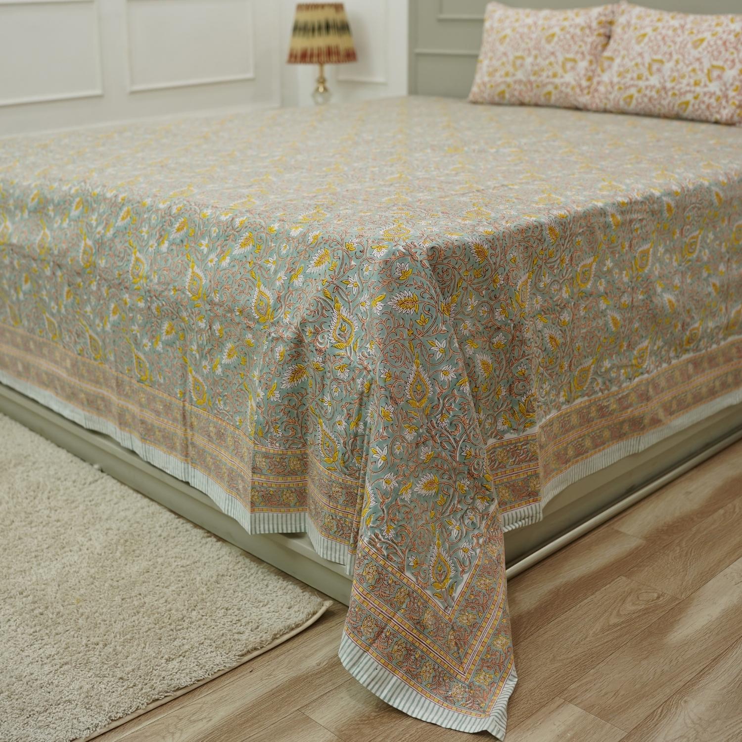 Our hand block printed cotton bedding set offers a unique floral design that celebrates heritage craftsmanship. Each detail is pressed by hand on soft cotton, creating a cozy, decorative accent for your bedroom.