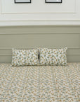 Let your bedroom bloom with handcrafted beauty. This hand block printed bedsheet on pure cotton, paired with pillow covers, captures floral artistry in soft tones. Each piece echoes heritage and the skill of artisans.
