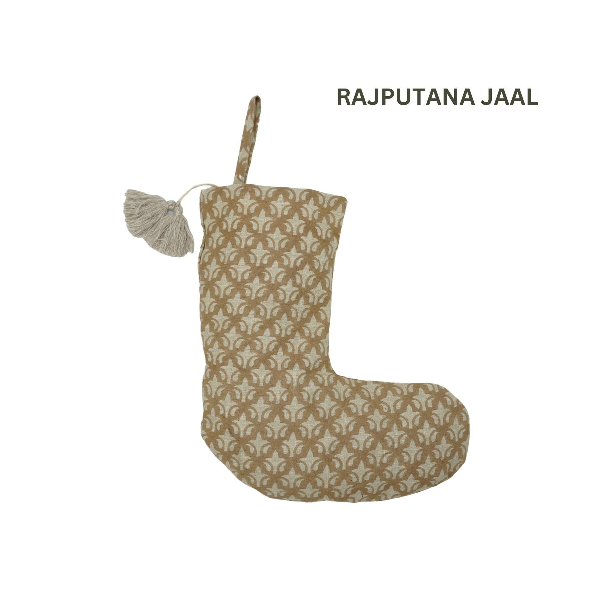Decorative stocking with 'Rajputana Jaal' pattern on white background.