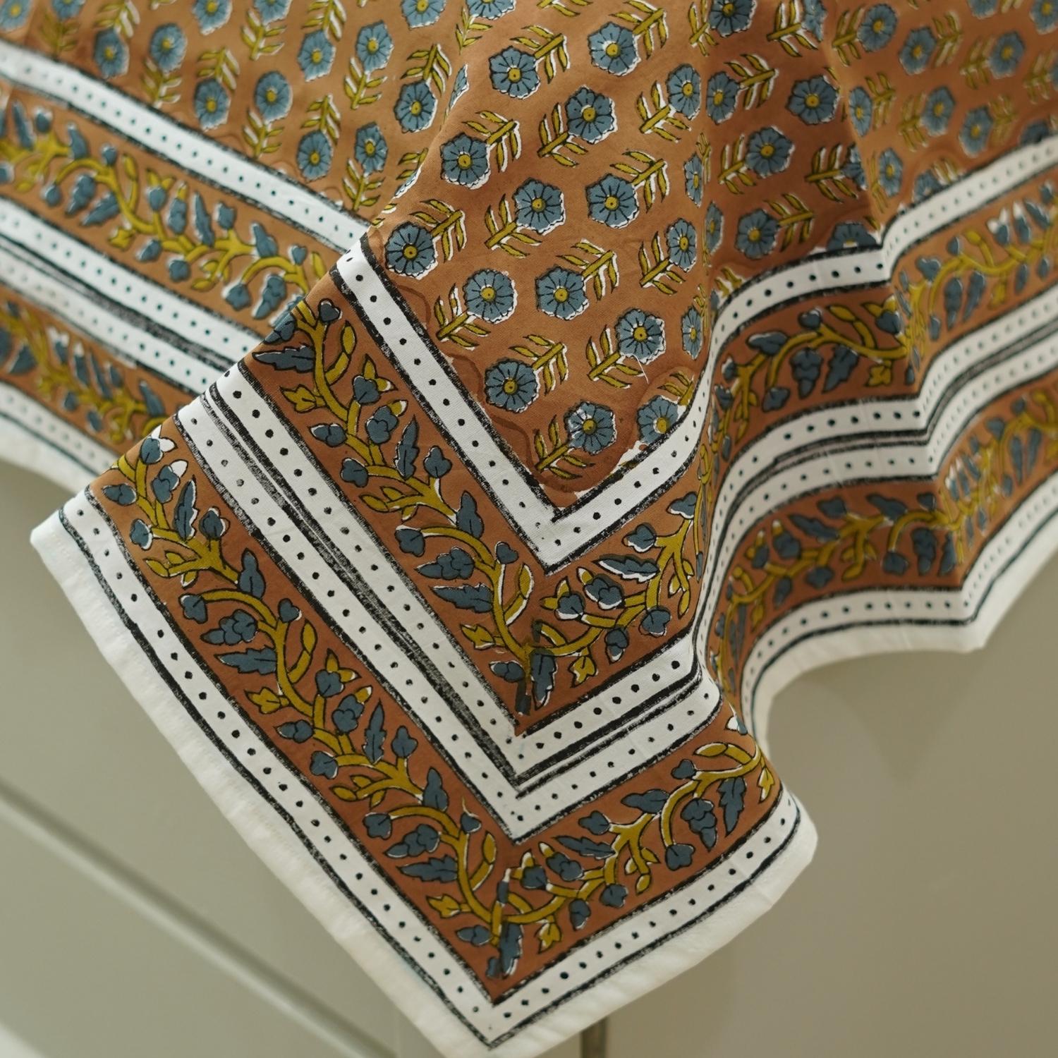 This floral hand block printed cotton bedsheet is a celebration of artisan skill. Each print is hand-stamped with care, making it a functional piece of art for your home.