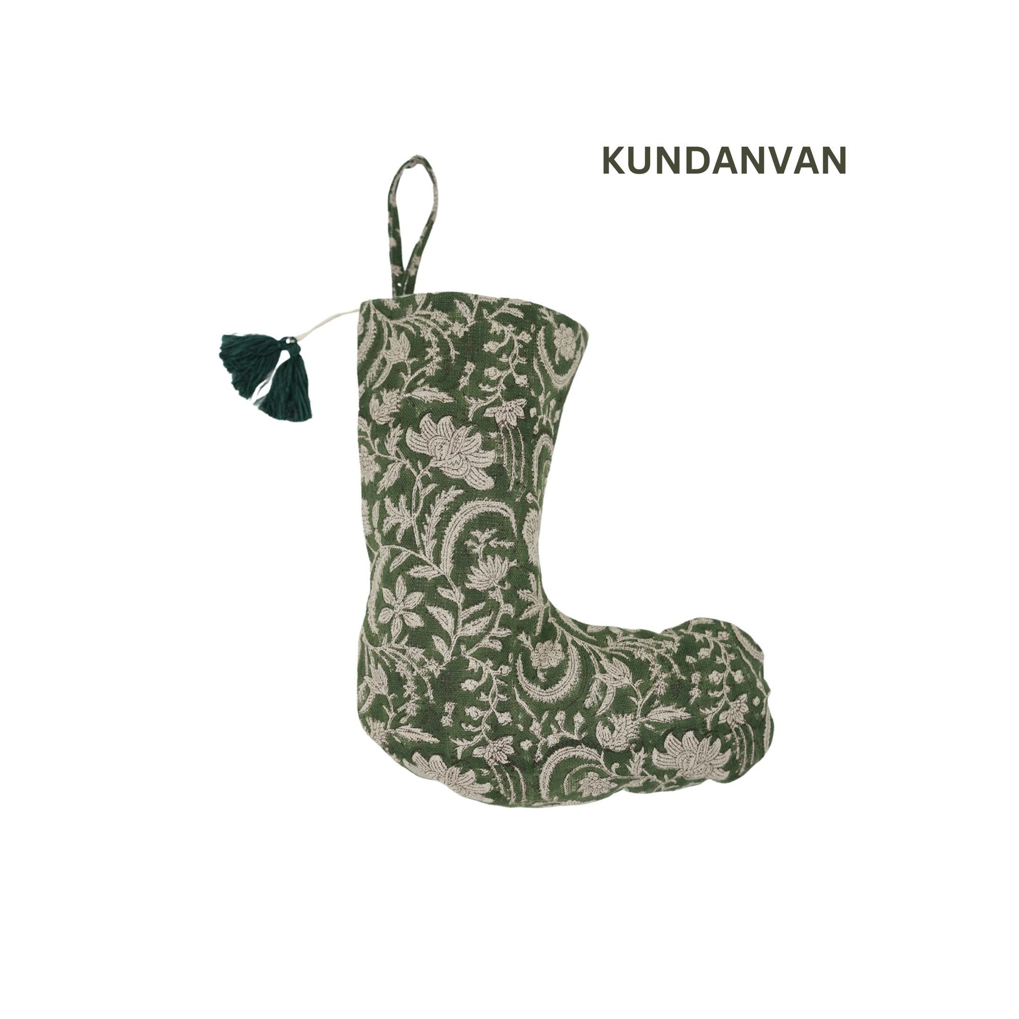 Green decorative stocking with floral pattern, branded 'Kundanvan', on white background.