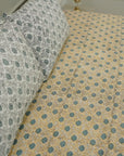 Crafted with care, this floral cotton bedsheet and pillow set features authentic hand block prints. Every piece reflects the spirit of bohemian decor with earthy tones, perfect for elevating your bedroom into a serene, artistic space.