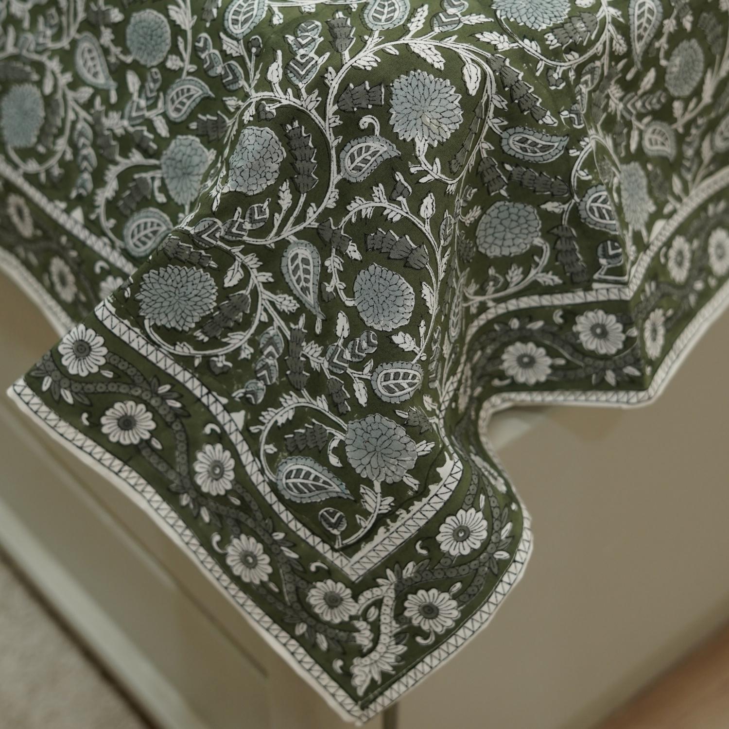 With this bedsheet and pillow cover set, embrace floral beauty created by hand. Block printed on cotton, this set brings cultural richness and relaxed elegance to any decor.