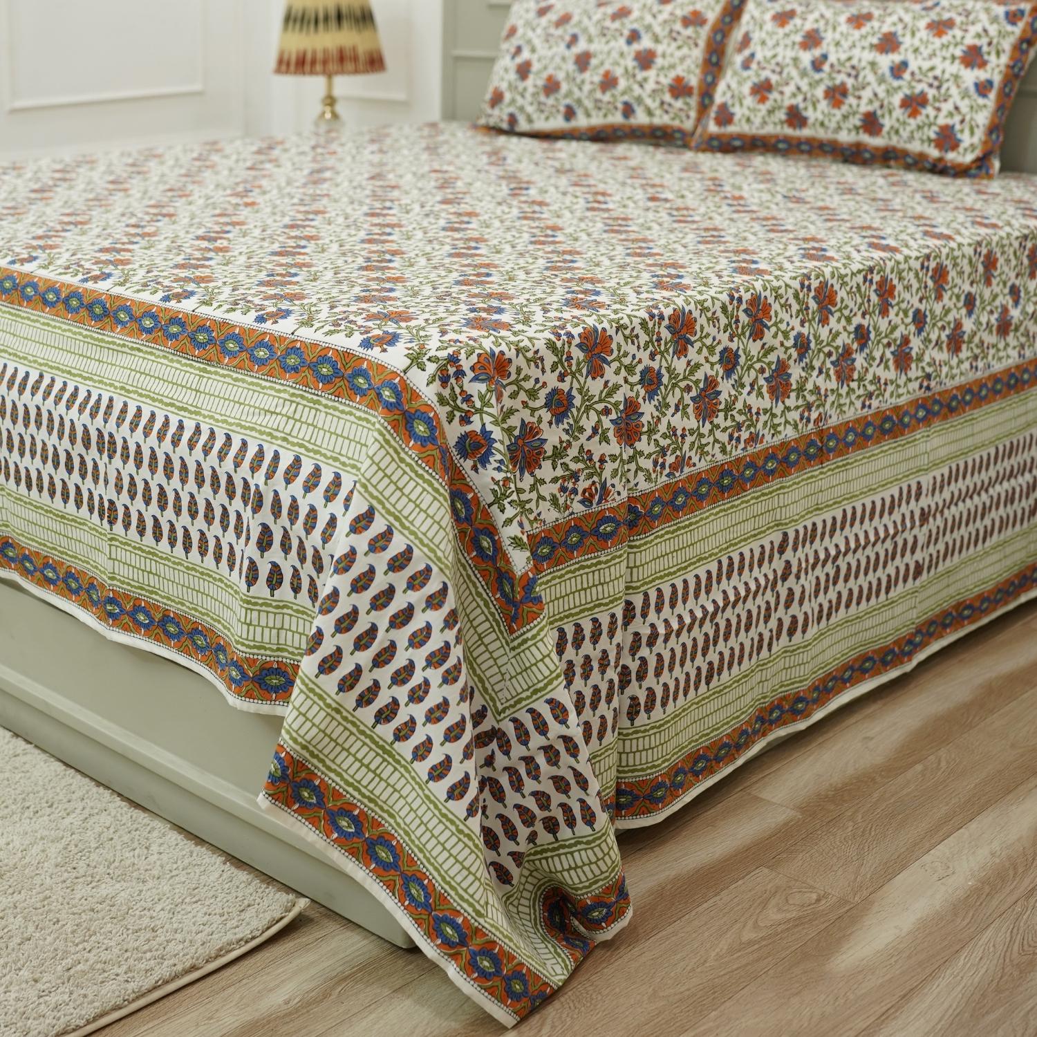 Embrace rustic charm with our block printed cotton bed linen. The floral patterns, hand-stamped using wooden blocks, celebrate Indian craftsmanship. This breathable cotton bedsheet and matching pillow cover add a soulful, artisanal touch to your home.