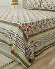 Embrace rustic charm with our block printed cotton bed linen. The floral patterns, hand-stamped using wooden blocks, celebrate Indian craftsmanship. This breathable cotton bedsheet and matching pillow cover add a soulful, artisanal touch to your home.