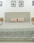 Reimagine your bedroom with this soft cotton bedsheet set, printed with elegant floral patterns using wooden blocks. This artisan creation delivers the perfect blend of comfort and visual delight.