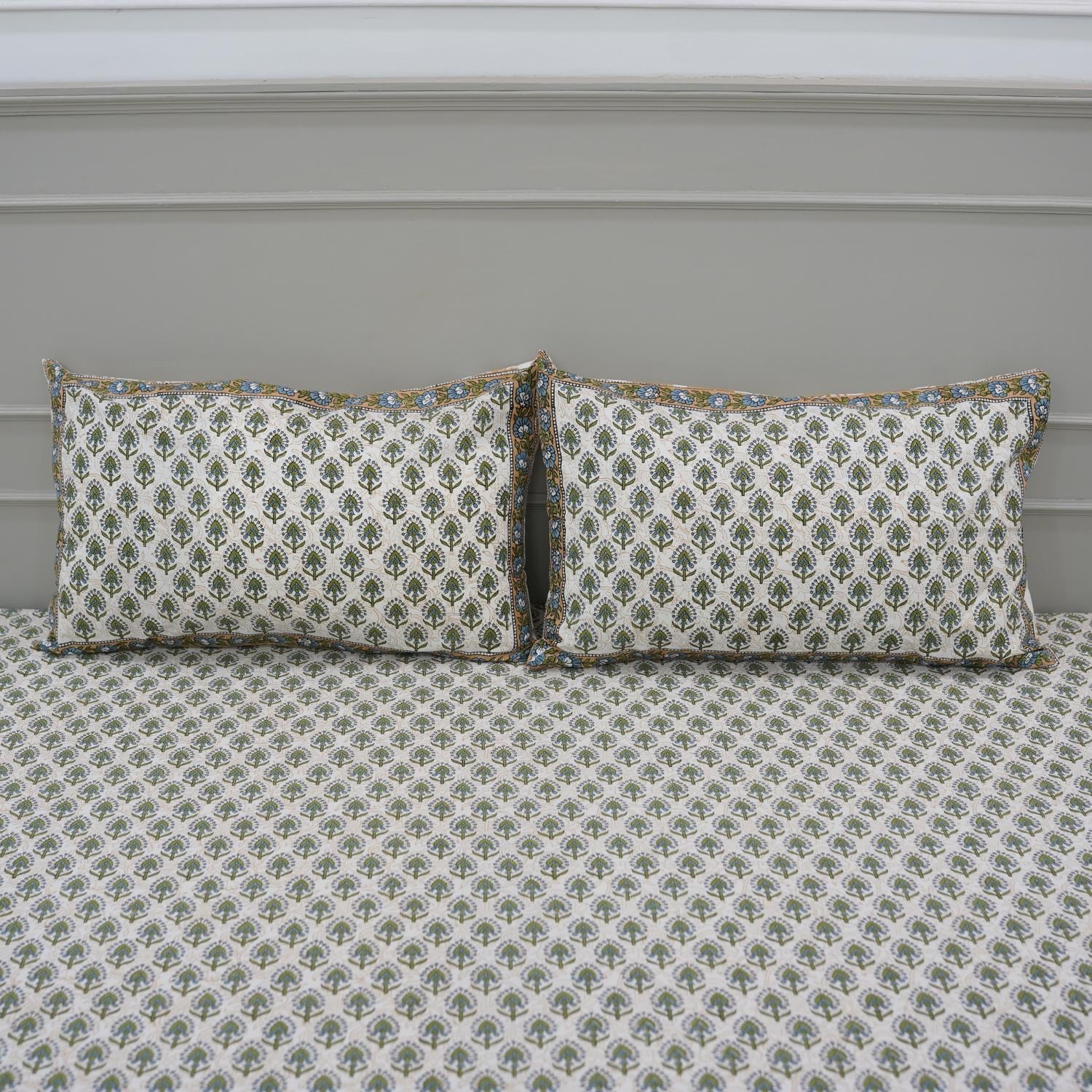 This floral hand block printed cotton bedsheet is a celebration of artisan skill. Each print is hand-stamped with care, making it a functional piece of art for your home.