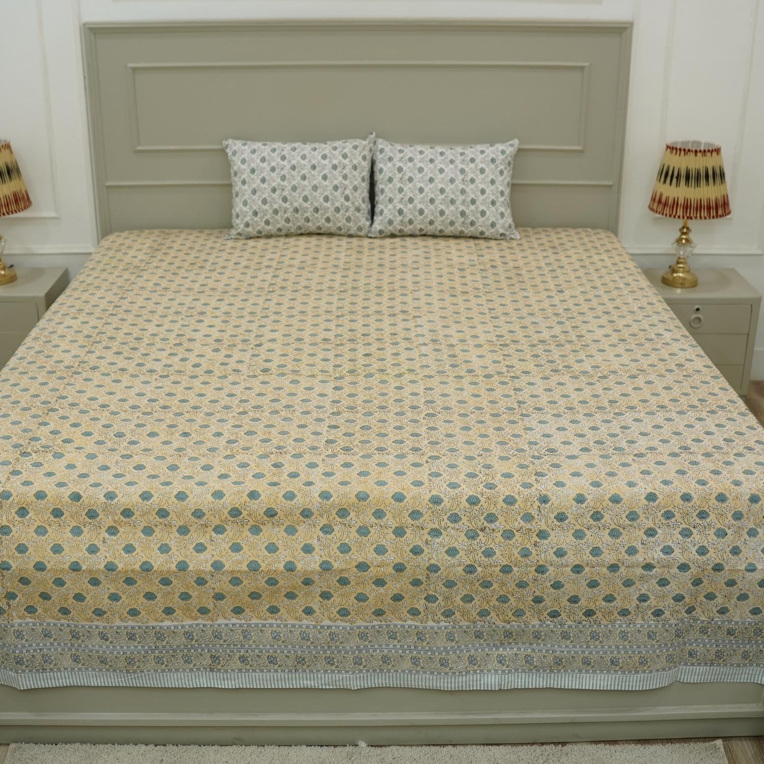 Add subtle sophistication to your bedroom with our hand block printed cotton bedsheet. This boho-style set includes matching pillow covers, showcasing nature-inspired patterns created using traditional printing techniques on soft, lightweight cotton.