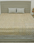 Add subtle sophistication to your bedroom with our hand block printed cotton bedsheet. This boho-style set includes matching pillow covers, showcasing nature-inspired patterns created using traditional printing techniques on soft, lightweight cotton.