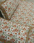 Add character to your bedding with this hand block printed cotton bedsheet. With matching pillow covers and floral art, it’s a perfect addition for bohemian lovers who cherish handmade details.