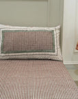 Timeless and elegant, this cotton bedsheet features floral block prints made by hand. The matching pillow covers complete a look of handcrafted luxury in a cozy, grounded palette.