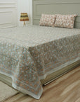 Immerse yourself in handcrafted beauty with this floral block printed bedsheet. Made of soft cotton and paired with matching pillow covers, it’s a thoughtful blend of traditional skill and modern living.