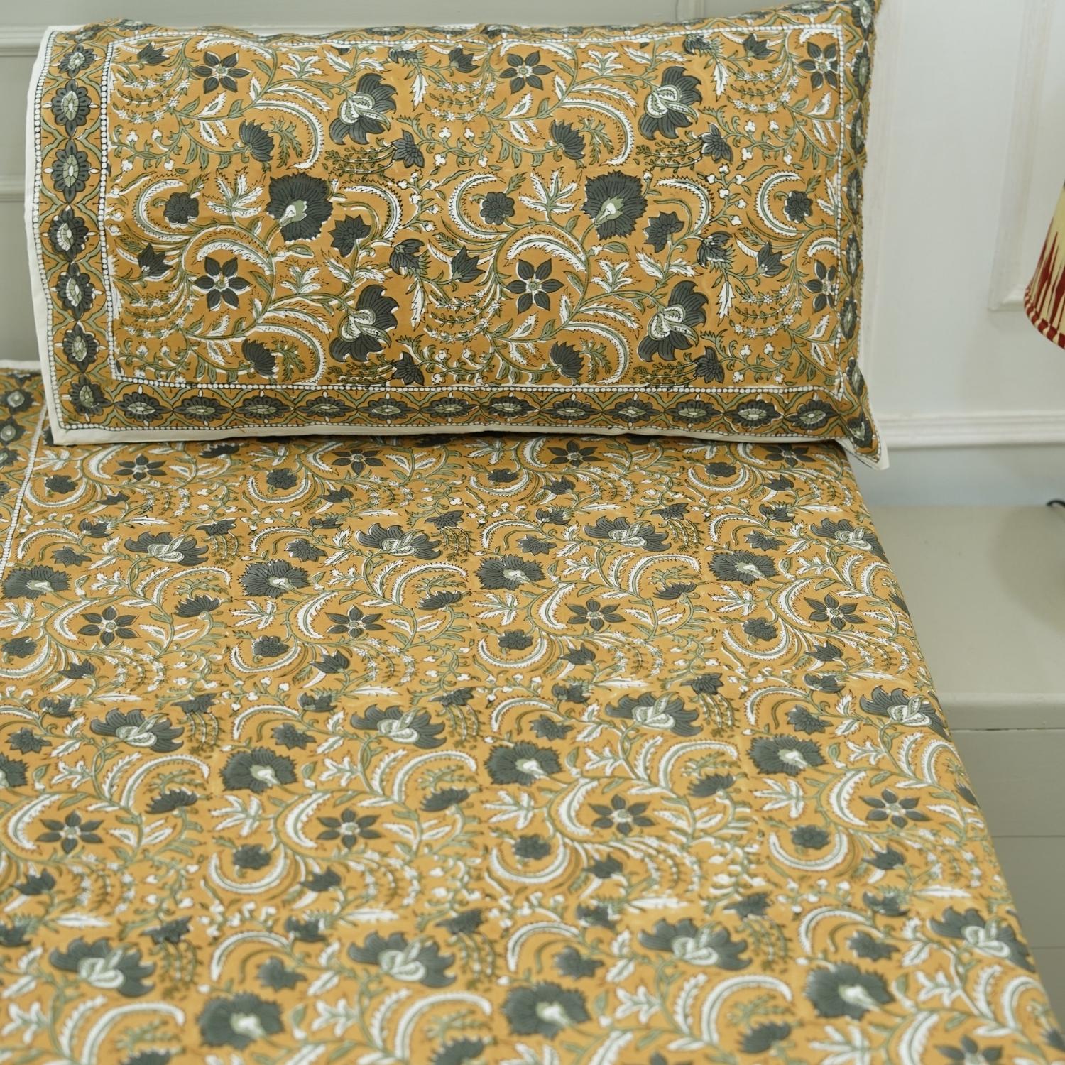 Discover floral block print beauty in our soft cotton bedsheet set. With its handmade touch and breathable fabric, it’s ideal for serene mornings and cozy nights.