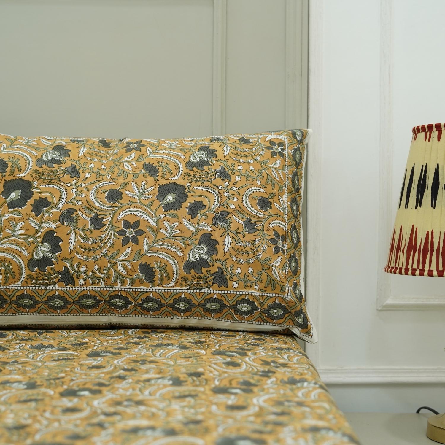 Let each night feel special with our floral hand block printed bedsheet. Crafted on premium cotton and paired with pillow covers, it adds handmade richness to your bedroom decor.