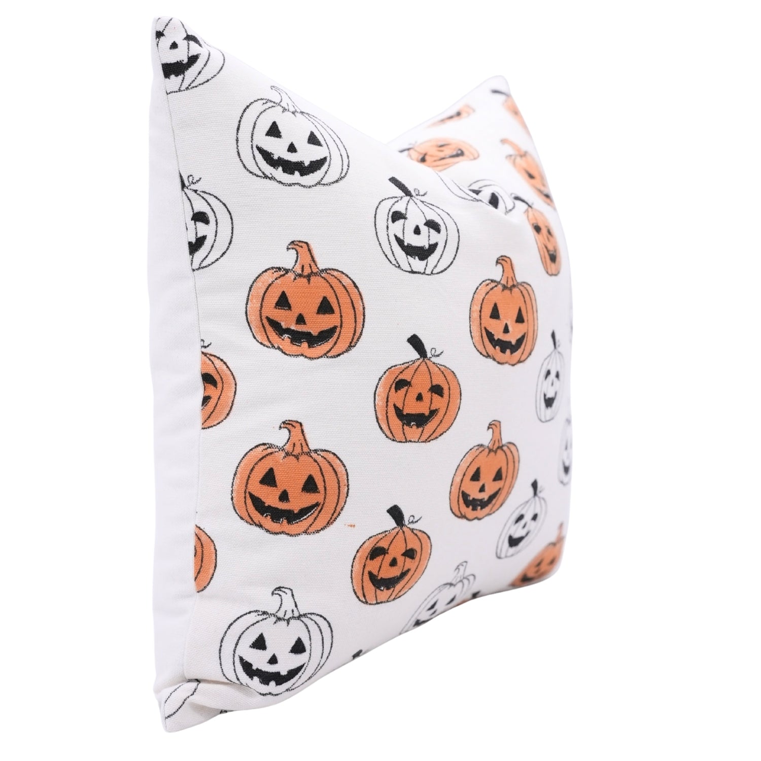 Pillow with Halloween-themed design featuring pumpkins and ghosts on a white background