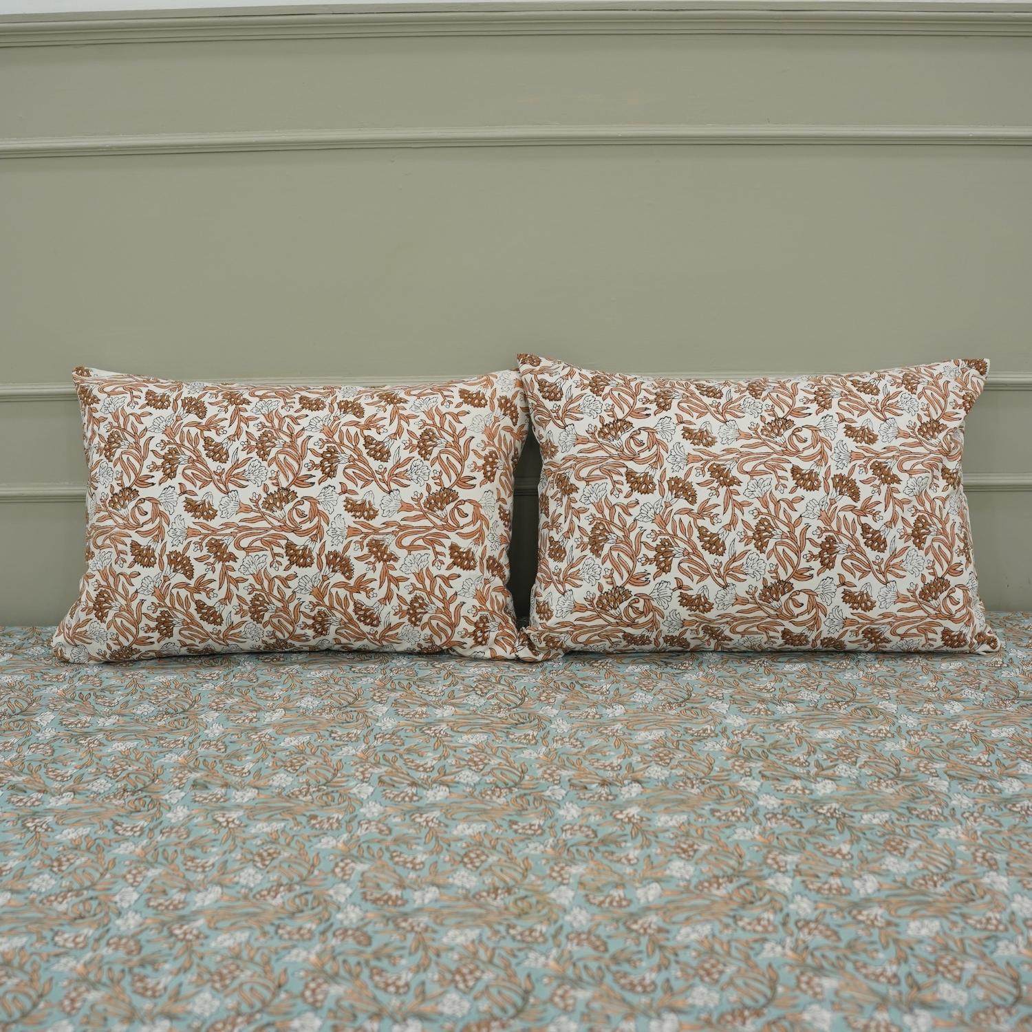 This block printed cotton bedsheet set adds timeless elegance to your room. Handmade with floral motifs, it reflects sustainable artistry while offering everyday comfort with a boho feel.