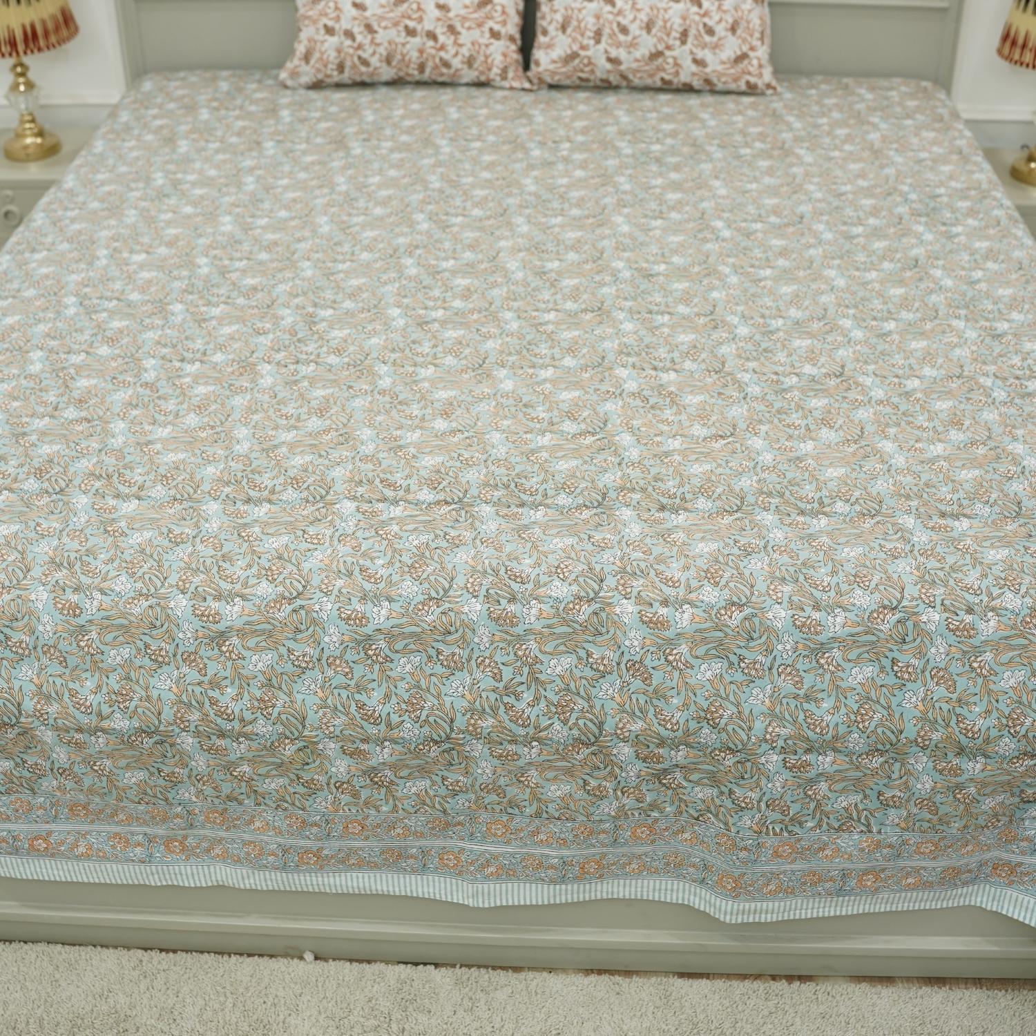 Brighten your space with this hand block printed floral cotton bedsheet and pillow set. The natural texture and handmade details make it a perfect choice for farmhouse or bohemian bedrooms.