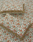Indulge in the softness of pure cotton with our floral hand block printed bedsheet. The set, complete with pillow covers, combines traditional technique and modern comfort, ideal for a cozy, elegant bedroom retreat.
