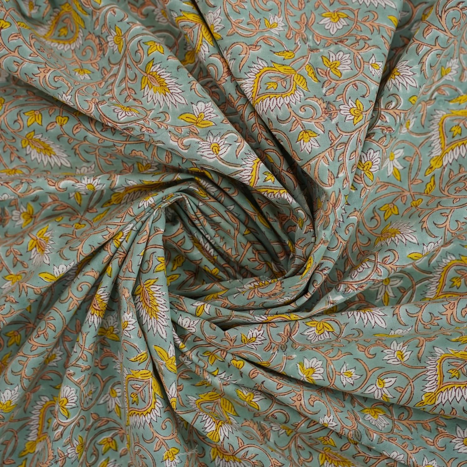 Immerse yourself in handcrafted beauty with this floral block printed bedsheet. Made of soft cotton and paired with matching pillow covers, it’s a thoughtful blend of traditional skill and modern living.