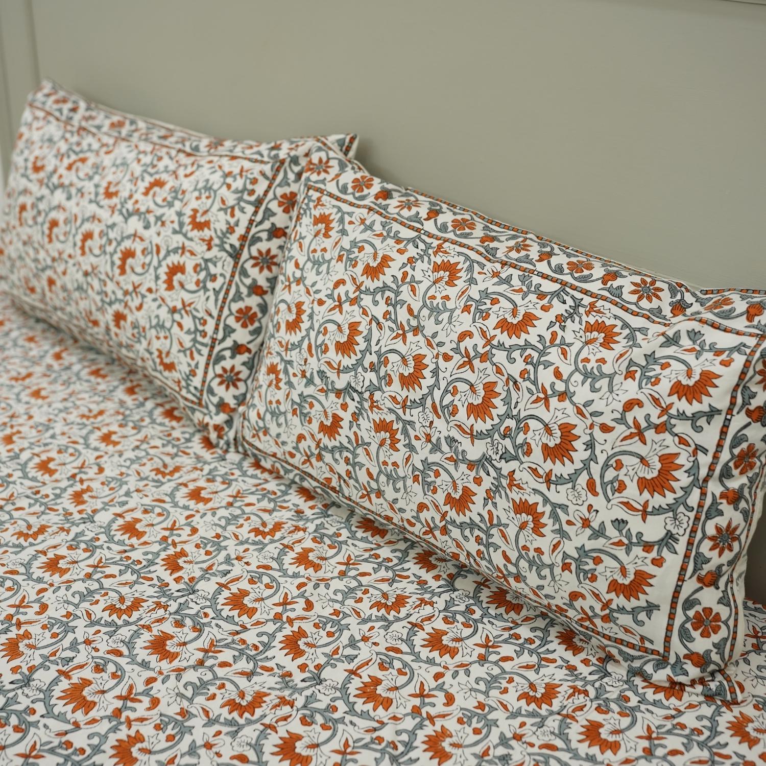 Let traditional craftsmanship meet everyday comfort in this cotton bedsheet set. Featuring floral hand block prints and matching pillow covers, it adds cultural depth and serenity to your sleeping space.