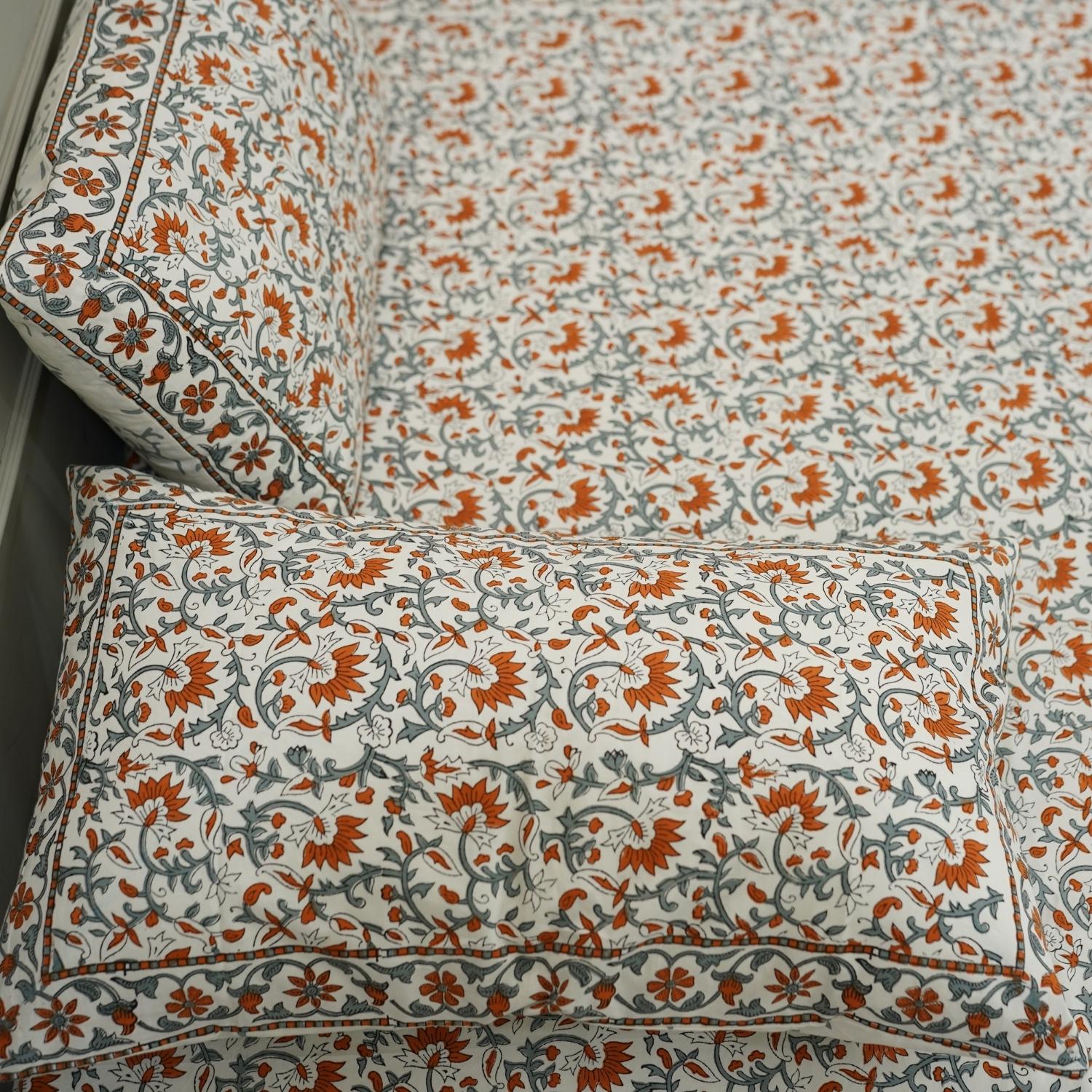 Every inch of this floral bedsheet and pillow set is infused with tradition. Hand block printed on soft cotton, it’s a natural, charming addition to your handcrafted home.