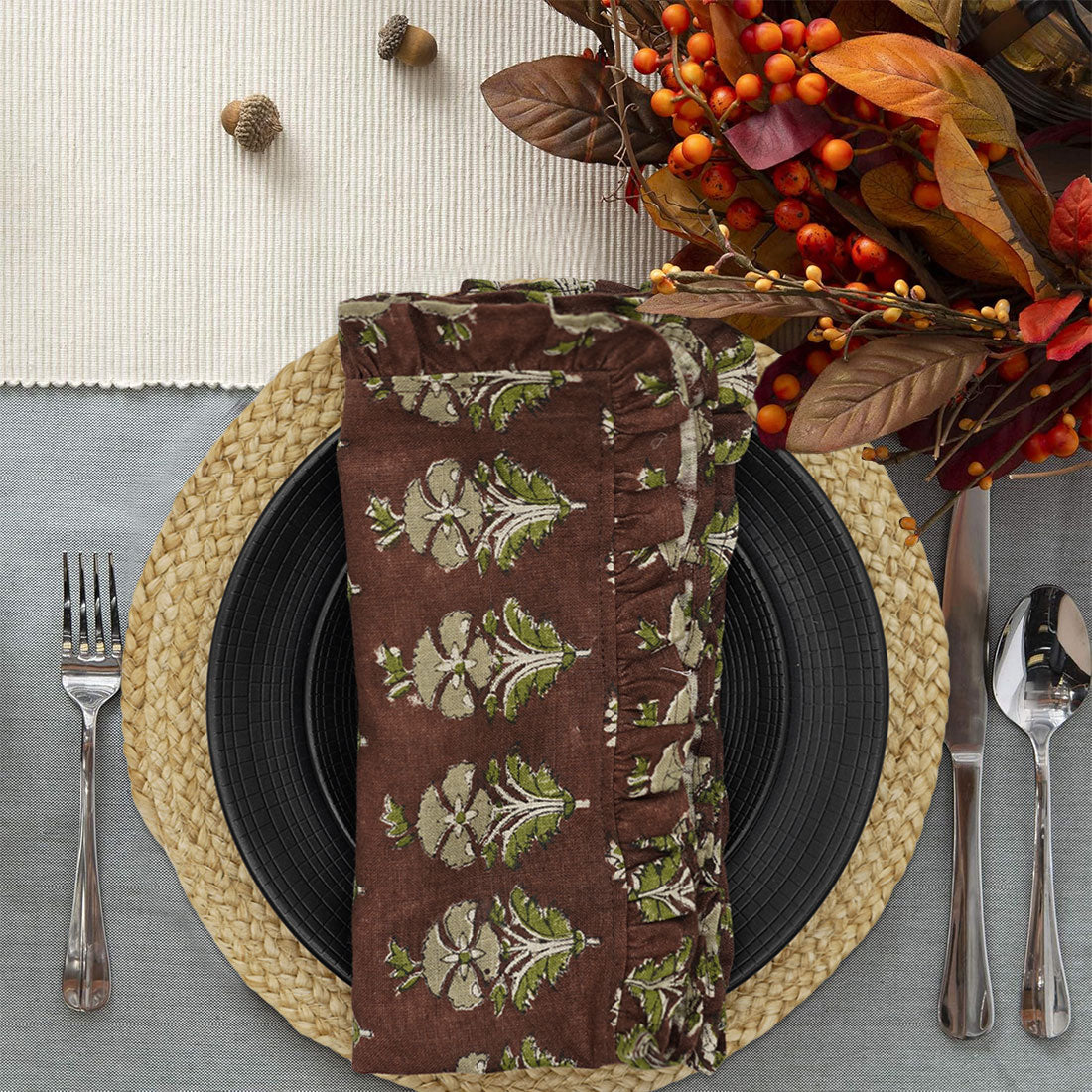 Elephant block print frill napkin on a cozy table setting.