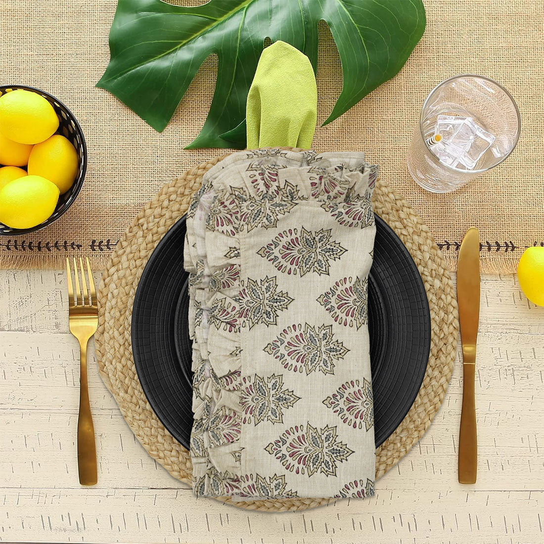 Floral block print frill napkin on a beautifully set table.