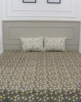 Brighten your space with this hand block printed floral cotton bedsheet and pillow set. The natural texture and handmade details make it a perfect choice for farmhouse or bohemian bedrooms.
