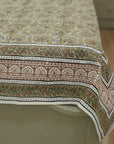 Decorative bedsheet with intricate block print patterns.