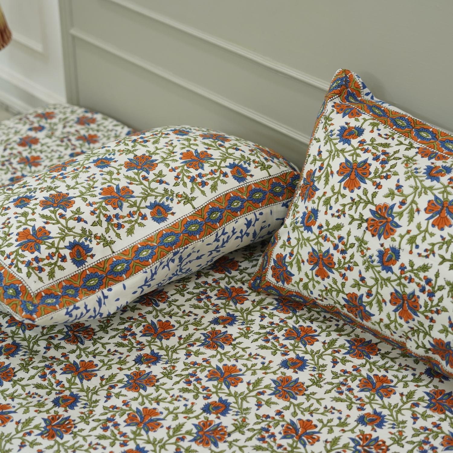 Our hand block printed cotton bed linen is perfect for those who love unique art. Featuring floral designs printed with wooden blocks, this breathable cotton bedsheet and pillow cover enhance both farmhouse charm and everyday comfort.