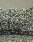 The delicate charm of block printing shines in this cotton bedsheet. Its floral design and pillow covers evoke rustic elegance, perfect for cozy homes with a handmade heart.