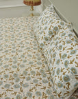 Infuse your bedroom with the delicate art of wooden block printing. This cotton bedsheet and pillow cover set showcases timeless floral patterns, hand-pressed to ensure authenticity and charm in every inch.