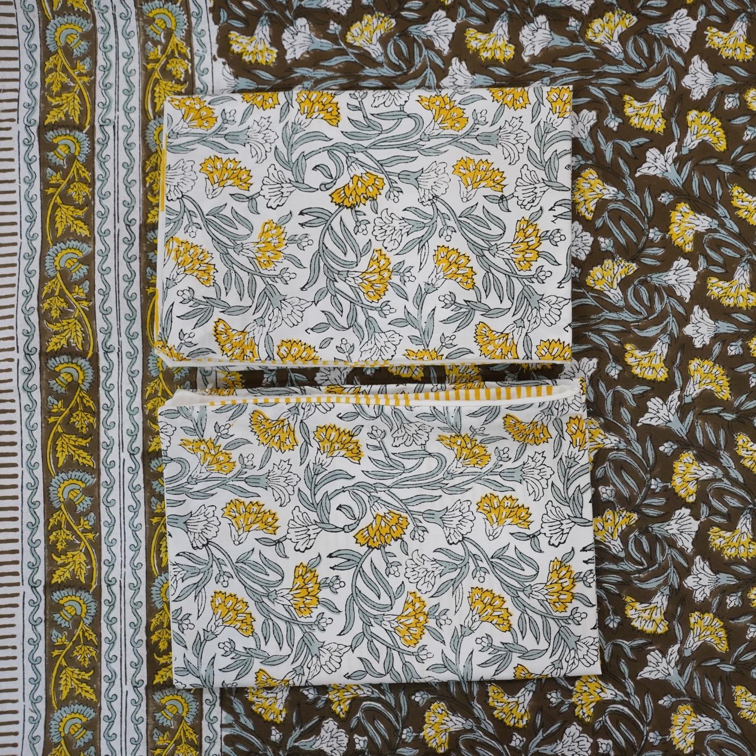 This block printed cotton bedsheet set adds timeless elegance to your room. Handmade with floral motifs, it reflects sustainable artistry while offering everyday comfort with a boho feel.