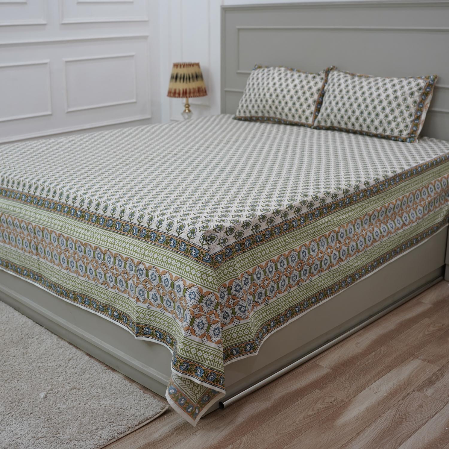 Make a subtle statement with our hand block printed cotton bedsheet set. Featuring timeless floral motifs and soft, breathable fabric, it transforms your bedroom into a peaceful haven.