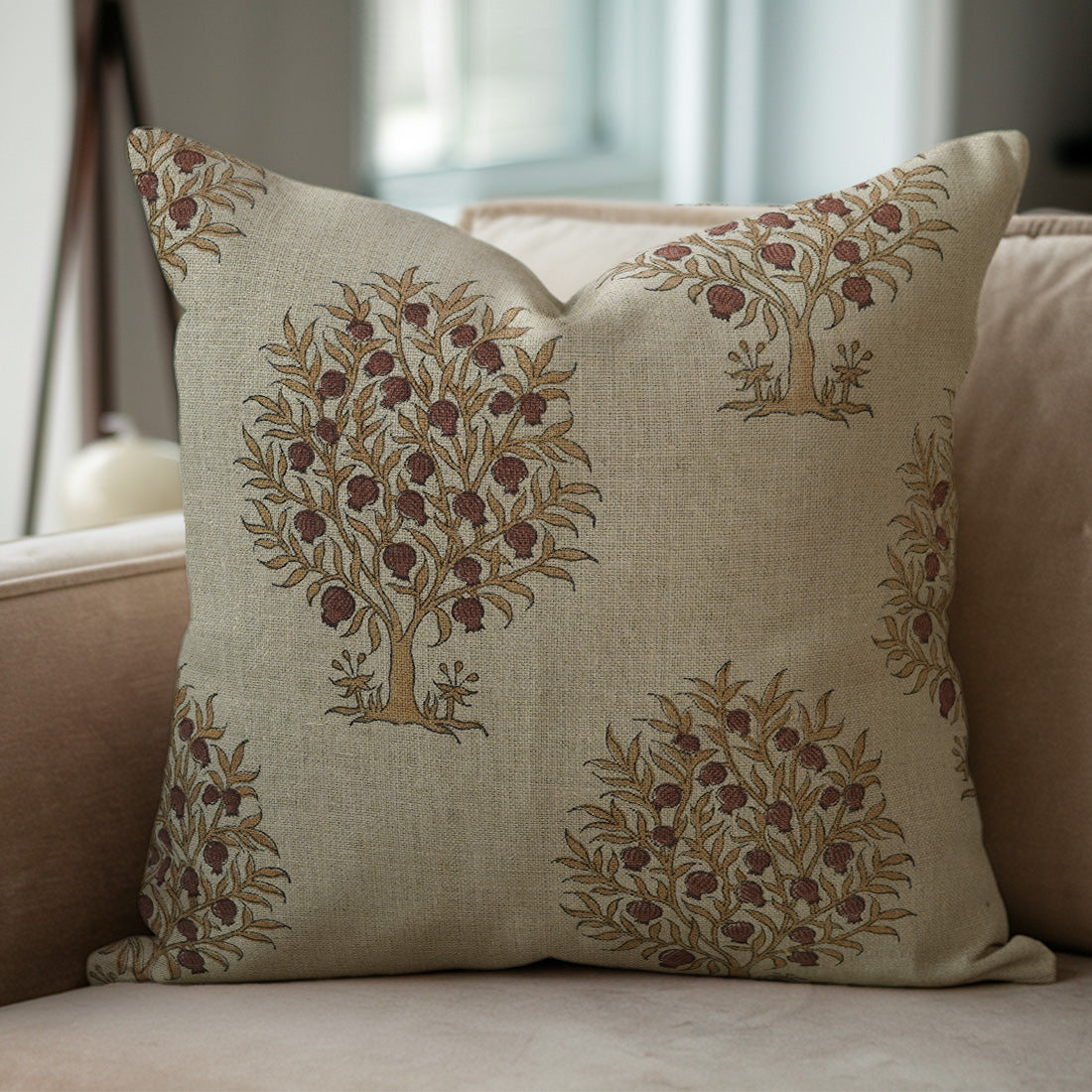 Linen pillow with decorative tree pattern 