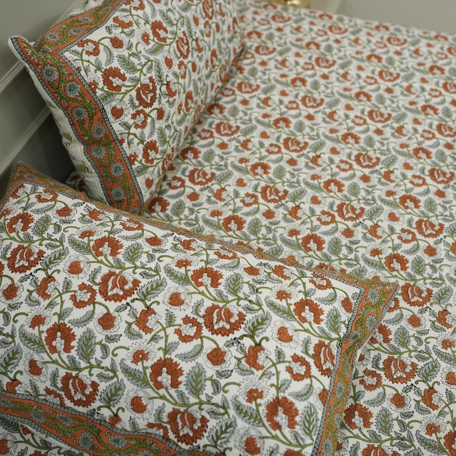 Add character to your bedding with this hand block printed cotton bedsheet. With matching pillow covers and floral art, it’s a perfect addition for bohemian lovers who cherish handmade details.