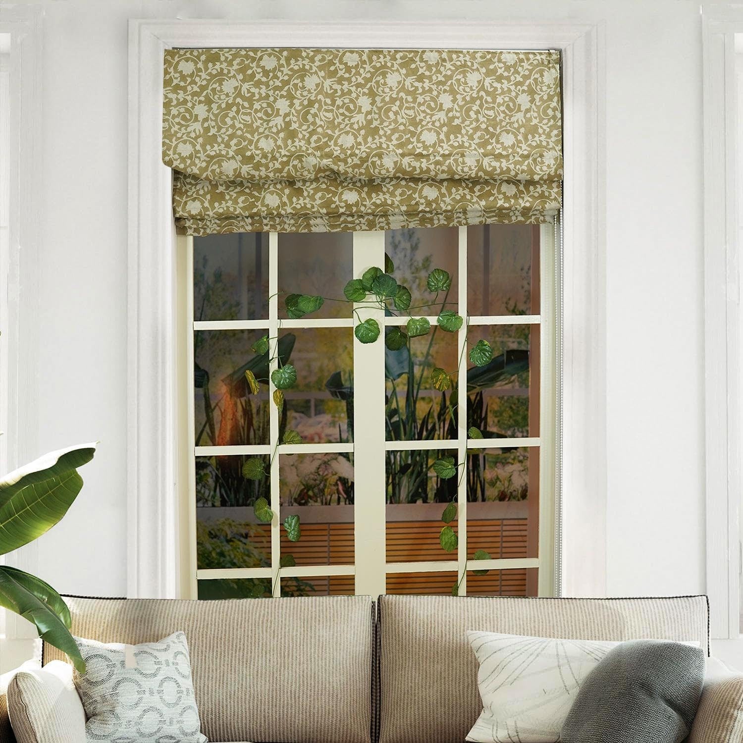 Corded roman blinds made from linen with handmade floral motifs. Thoughtfully crafted and easy to use, these are ideal for elevating cozy interiors.