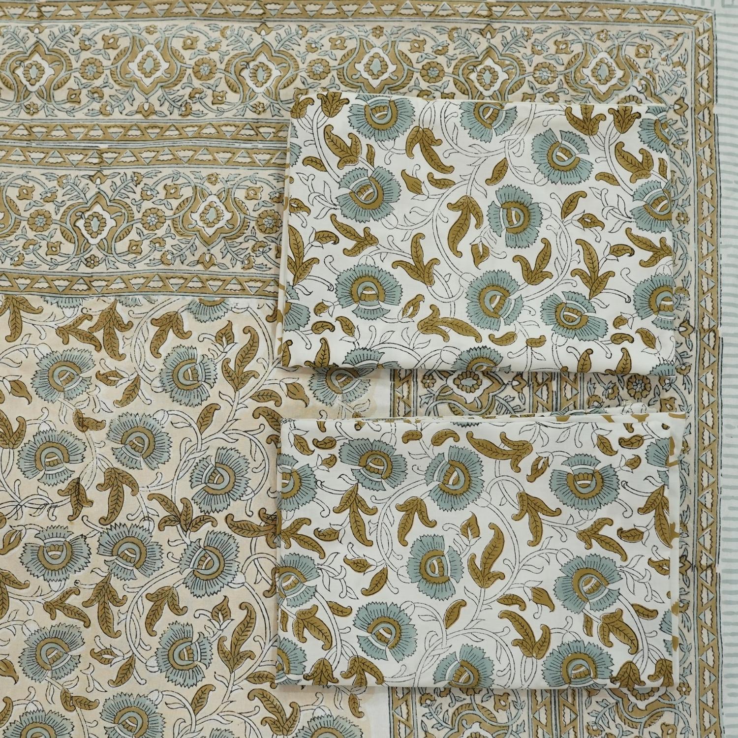 Feel the softness of handwoven cotton adorned with floral block prints in this bedsheet and pillow cover set. Each pattern is carefully stamped by hand, offering authenticity and an earthy, artistic vibe.