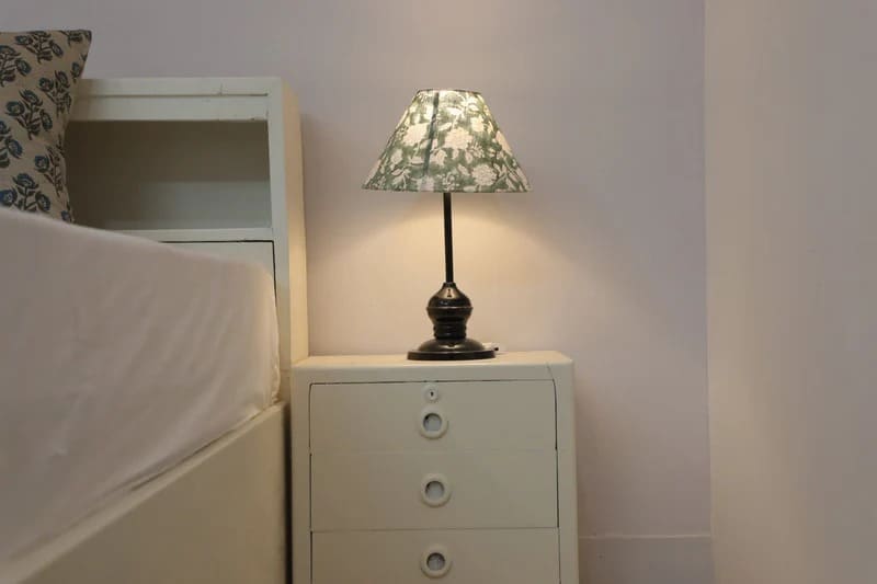Metal cone lampshade with decorative fabric cover