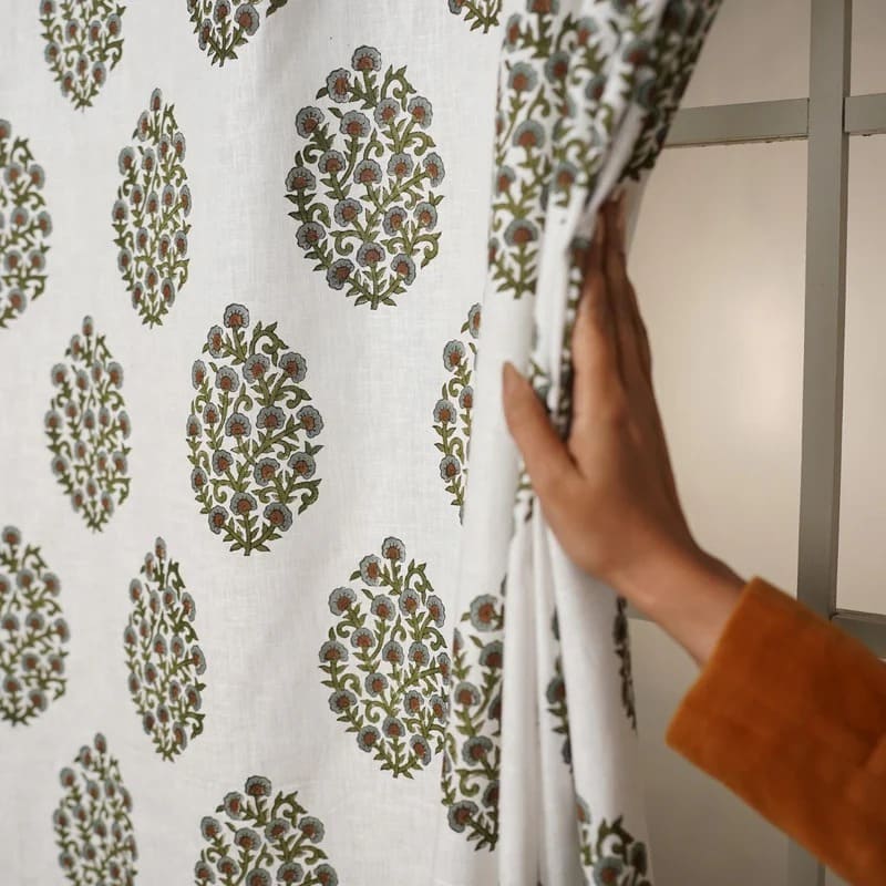 Green patterned curtains with botanical print