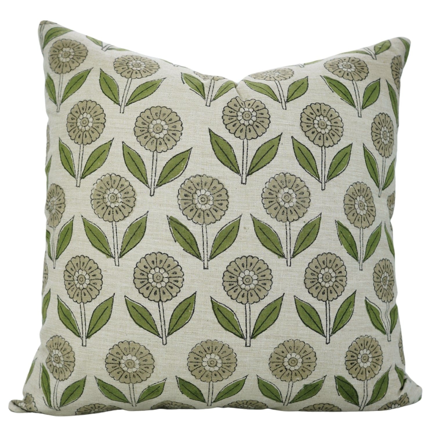 Decorative pillow with green floral handblock print on a beige background
