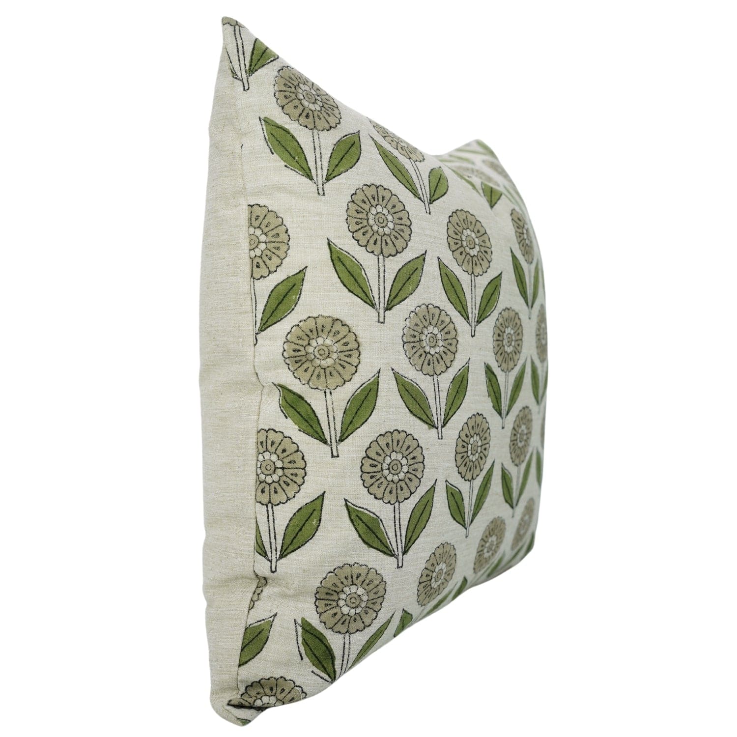 White cushion cover featuring green floral handblock print design