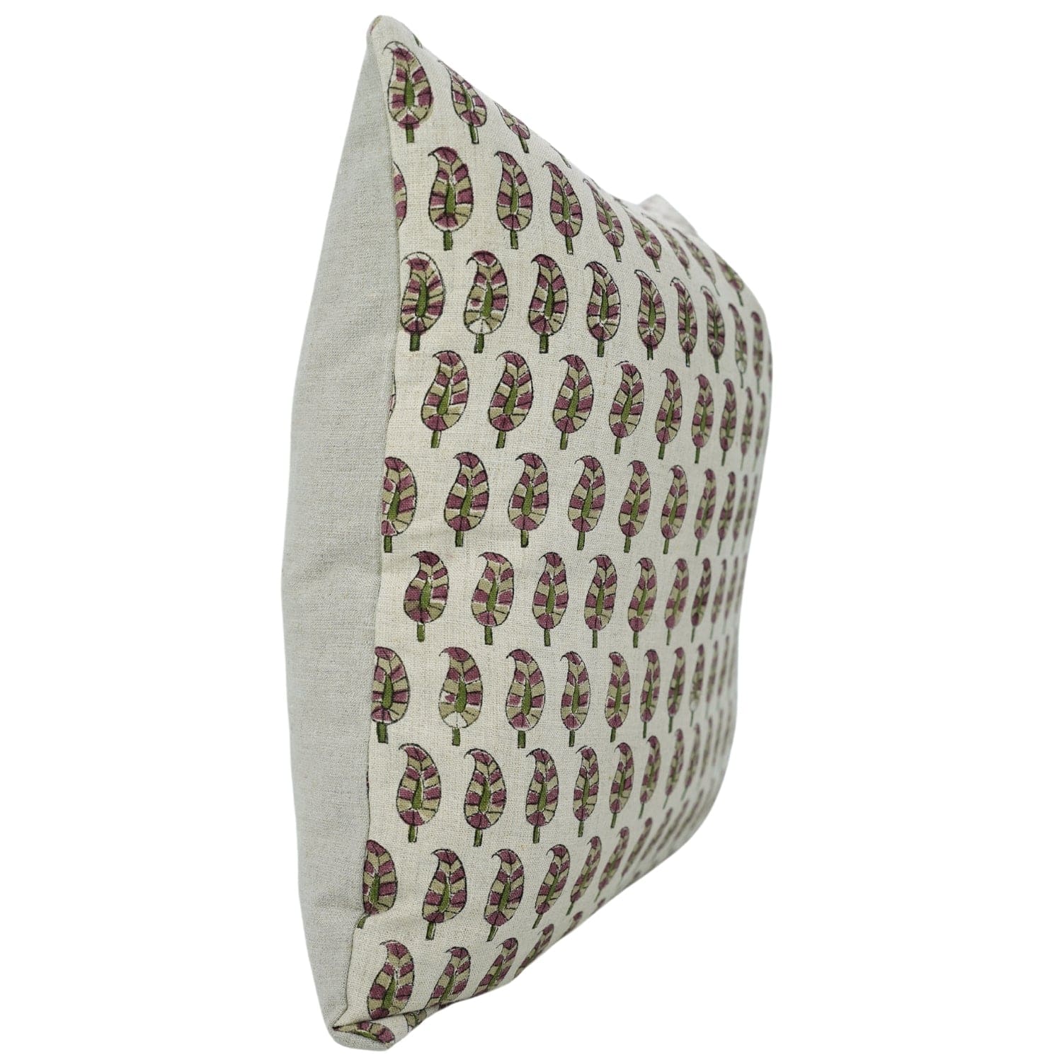 Block printed cushion with green leaf motifs on white fabric