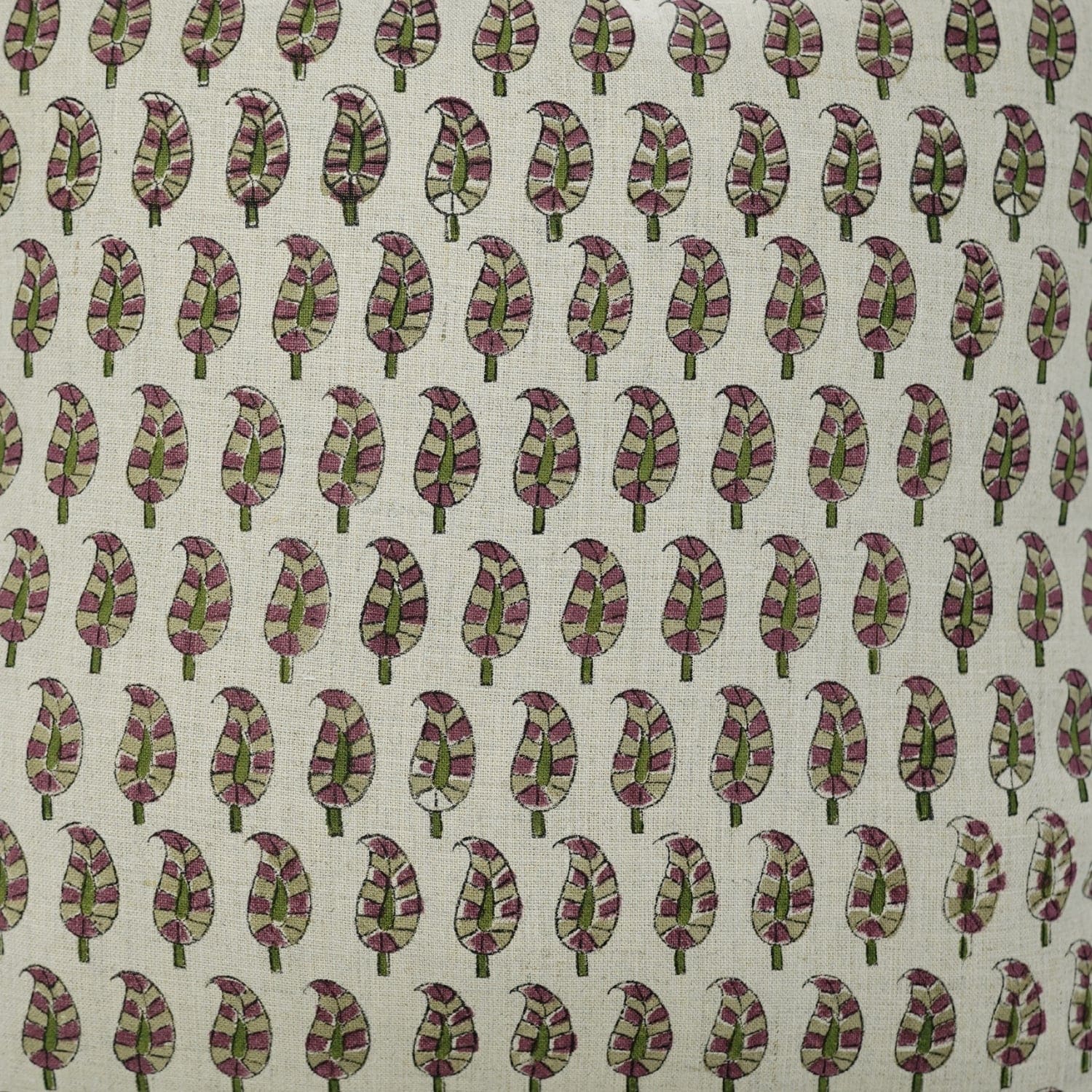 Artisan block printed design of trees with green and purple leaves on a beige base