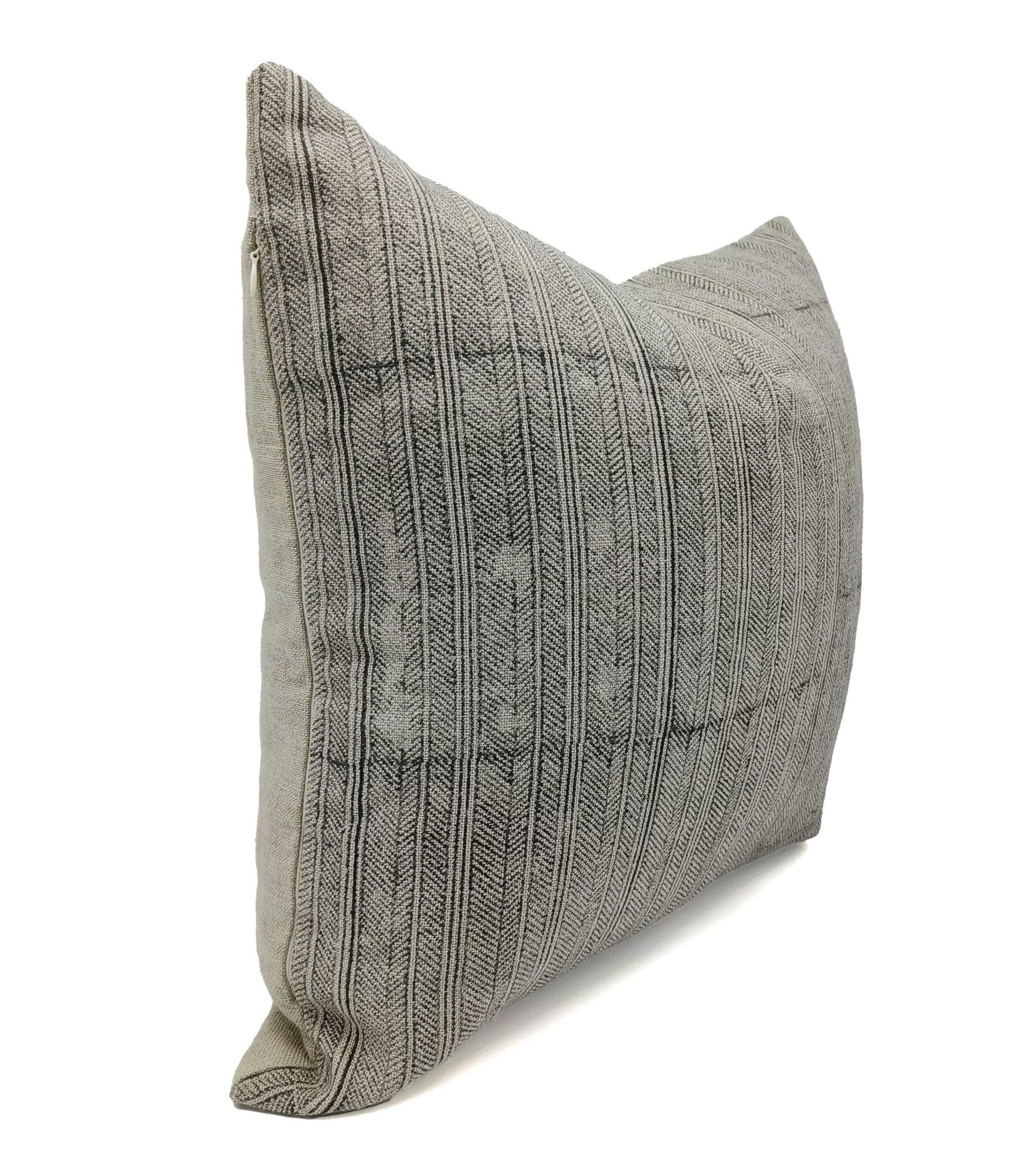 Textured gray outdoor pillow cover on a white background