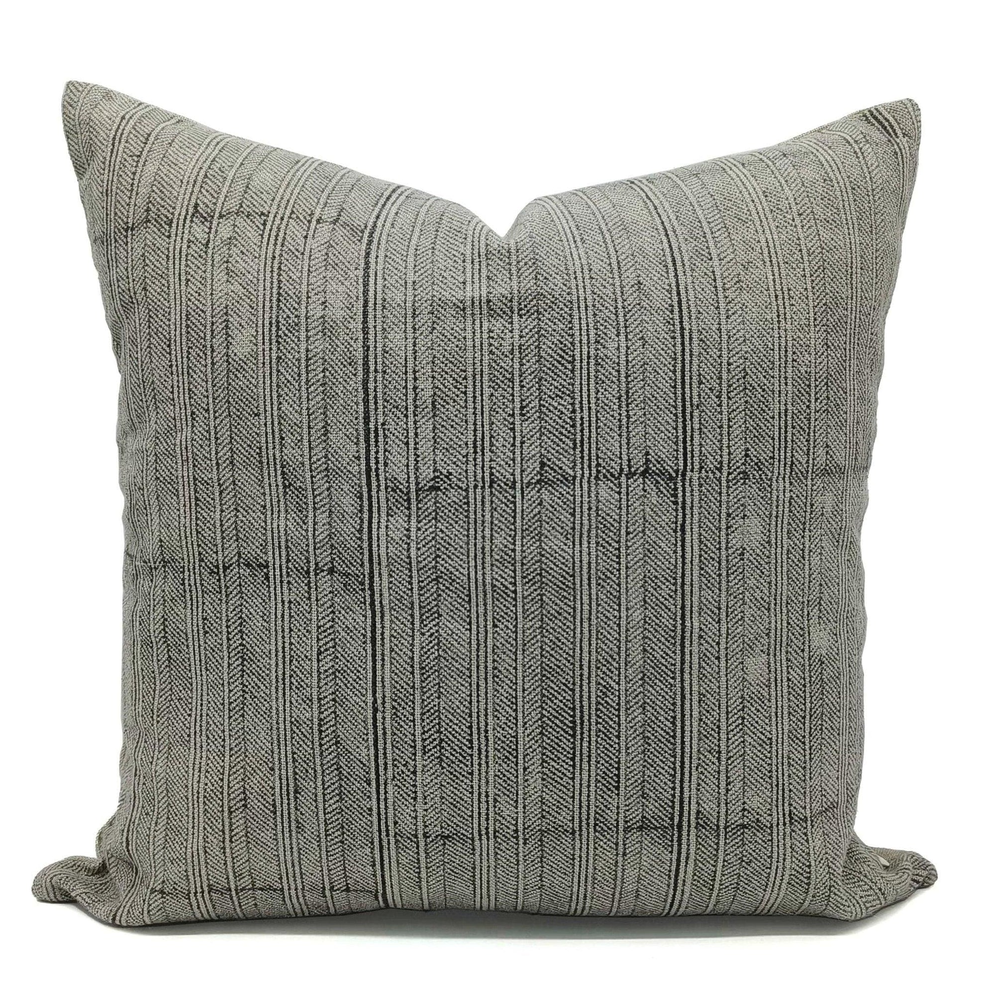 Textured gray outdoor pillow cover on a white background