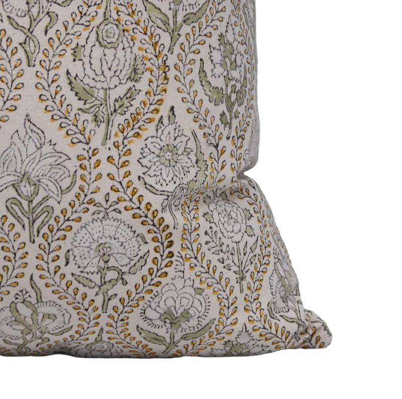 Decorative pillow with floral pattern on a white duck canvas fabric 